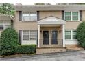 Charming brick condos, black shutters and a welcoming front entrance at 2232 Dunseath Nw Ave # 309, Atlanta, GA 30318