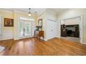 Inviting foyer with hardwood floors, double doors, and view of office at 84 Nw Gloster Nw Rd, Lawrenceville, GA 30044