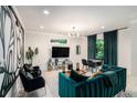 Modern living room featuring stylish decor, including plush seating and trendy artwork at 76 Mayson Avenue Northeast Ne, Atlanta, GA 30307
