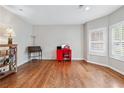 Bright office space featuring hardwood floors and windows with plantation shutters at 3065 Moser Way, Marietta, GA 30060