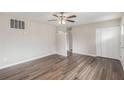 Bright living room boasting stylish wood floors and a modern ceiling fan at 3787 Stephanie Sw Dr, Atlanta, GA 30331
