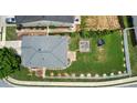 Aerial view of a home with a large, fenced backyard featuring a pergola and trampoline at 400 Silver Spring St, Dallas, GA 30157
