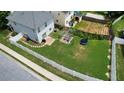 Spacious backyard featuring a pergola, concrete patio, new fence, and lush green grass at 400 Silver Spring St, Dallas, GA 30157