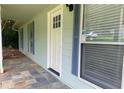 Charming front porch with beautiful slate flooring and view to the front yard at 1150 Terramont Dr, Roswell, GA 30076