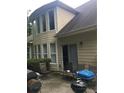 A secluded patio area, ideal for outdoor gatherings and relaxation, with ample seating and grill at 1697 Preserve Park Dr, Loganville, GA 30052
