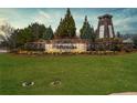 Community entrance sign amidst a well-manicured lawn and landscaping at 372 Garnet Dr, Acworth, GA 30101