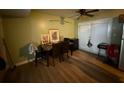 Cozy dining area with table and chairs next to a sliding glass door with natural lighting at 405 Fairburn Sw Rd # 64, Atlanta, GA 30331