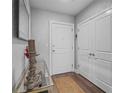 Inviting entryway featuring a neutral color palette, complemented by hardwood floors and a decorative rug at 270 17Th Nw St # 2804, Atlanta, GA 30363