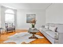 Comfortable living room with hardwood floors, neutral decor, and ample natural light at 389 Mill Creek Ne Bnd, Atlanta, GA 30307