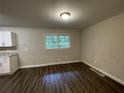 Kitchen with granite countertops and new vinyl flooring at 6106 Oak Hill Sw Dr, Austell, GA 30168