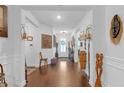 Inviting entryway with hardwood floors and decorative wall art at 2292 Knob Creek Rd, Snellville, GA 30078