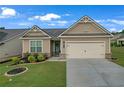 Charming one-story home with manicured lawn and two-car garage at 2292 Knob Creek Rd, Snellville, GA 30078