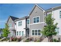 Well-maintained townhome exterior showcasing modern design, tidy landscaping, and inviting curb appeal at 1947 Drew Nw Dr, Atlanta, GA 30318