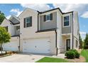 Attractive home exterior showing the garage and a neatly kept lawn at 1399 Flathead River Ln, Marietta, GA 30064