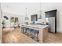 Beautiful kitchen with stainless steel appliances, modern island, and hardwood flooring at 1238 Memorial Se Dr # A, Atlanta, GA 30316