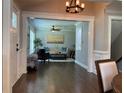 Inviting living room showcases gleaming hardwood floors and elegant decor at 2170 Beecher Sw Cir, Atlanta, GA 30311