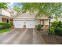 Charming home featuring a two-car garage and well-maintained landscaping at 2685 Gateview Ct, Cumming, GA 30040