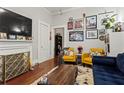 Cozy living room with fireplace, unique decor, and comfortable seating arrangement at 210 Evans Dr, Decatur, GA 30030