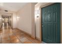 Hallway with ceramic tile floor and view of the unit door at 10 Perimeter Summit Ne Blvd # 4223, Brookhaven, GA 30319