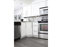 Modern kitchen featuring stainless steel appliances, granite countertops, and ample cabinet space at 2870 Pharr Court South Nw # 2507, Atlanta, GA 30305