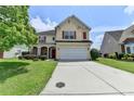 Two-story home with red shutters, manicured lawn, and a long driveway at 7196 Toccoa Circle, Union City, GA 30291