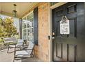 Cozy front porch with comfortable seating, perfect for enjoying the outdoors at 3420 Pleasant Springs Dr, Cumming, GA 30028