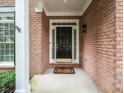 A detailed close up of the front door and brick exterior at 740 Orchard Ct, Atlanta, GA 30328