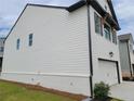 Charming two-story home with white siding and painted brick at 11 Butternut Way, Auburn, GA 30011
