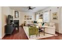 Cozy living room with hardwood floors, fireplace, and comfortable seating at 3351 Cumberland Club Dr # 17, Atlanta, GA 30339
