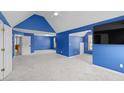 Expansive bedroom with vaulted ceiling, recessed lighting, and neutral carpet at 40 Queensland Ln, Covington, GA 30016