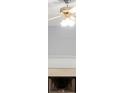 Cozy living room with fireplace and ceiling fan at 40 Queensland Ln, Covington, GA 30016