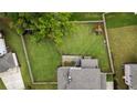 Aerial view of a large, fenced backyard with a playset at 4395 Capstone Court, Roswell, GA 30075