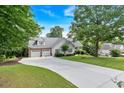 Lovely home with an attached two-car garage, and a long driveway provides ample parking at 17 Sassafras Ne Trl, Cartersville, GA 30121