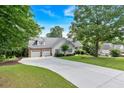 Lovely home with an attached two-car garage, and a long driveway provides ample parking at 17 Sassafras Ne Trl, Cartersville, GA 30121