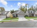 A street view showcases this beautiful single-story home with well-maintained landscaping at 218 Floral Valley Dr, Woodstock, GA 30188
