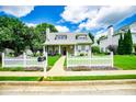 Lovely home featuring a white picket fence and lush green lawn, enhancing its curb appeal at 2763 Nautical Way, Villa Rica, GA 30180