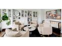 Comfortable living room featuring neutral-toned seating and modern decor, perfect for relaxing at 1952 Sugarstone Dr, Lawrenceville, GA 30043