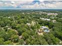 Scenic aerial view displays a neighborhood surrounded by lush green trees at 265 Mayfield Rd, Alpharetta, GA 30009