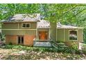 Charming home with an inviting front entrance and meticulously kept yard at 970 Pine Grove Pointe Dr, Roswell, GA 30075