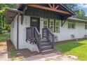 Inviting front porch with craftsman details, freshly painted in neutral tones at 1769 W Austin Rd, Decatur, GA 30032