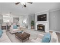Spacious living room featuring a fireplace, plush seating, and open layout at 3044 Lauren Parc Rd, Decatur, GA 30032