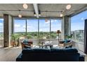 Stylish living room with modern decor, comfortable seating, and panoramic city views at 943 Peachtree Ne St # 814, Atlanta, GA 30309
