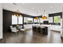 Gourmet kitchen with marble island, black backsplash, stainless appliances, and breakfast nook at 2220 Meadowvale Ne Dr, Atlanta, GA 30345
