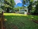 Spacious backyard with well-kept lawn at 4798 Mary Dale Ct, Lilburn, GA 30047