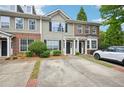Charming townhome features well-maintained landscaping and private driveways at 2084 Del Lago Nw Cir # 1, Kennesaw, GA 30152