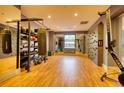 Spacious gym with varied equipment including punching bags, free weights, and climbing wall for a complete workout at 795 Hammond Dr # 506, Sandy Springs, GA 30328