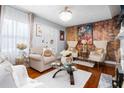 Cozy living room with stylish décor, hardwood floors, and ample seating arrangement at 1776 Fairway Hill Se Dr, Atlanta, GA 30317