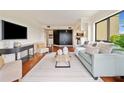 Cozy living space featuring an entertainment area, stylish furniture, and an open layout at 795 Hammond Dr # 808, Sandy Springs, GA 30328