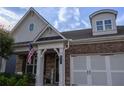 Close up of the front of the home showing a stone facade and a welcoming front porch at 513 Forest Ln, Canton, GA 30114