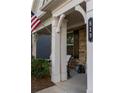 Inviting front porch with decorative columns and space for outdoor seating at 513 Forest Ln, Canton, GA 30114